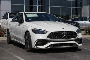 White Mercedes-AMG C43 sedan parked